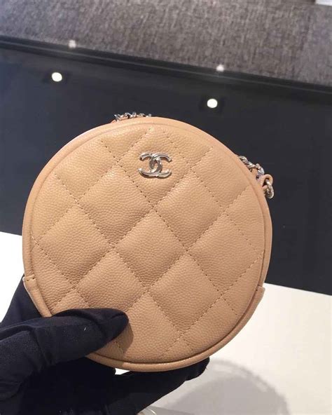 chanel small classic clutch with chain|Chanel round clutch with chain.